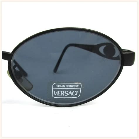 help identifiing versace sunglasses